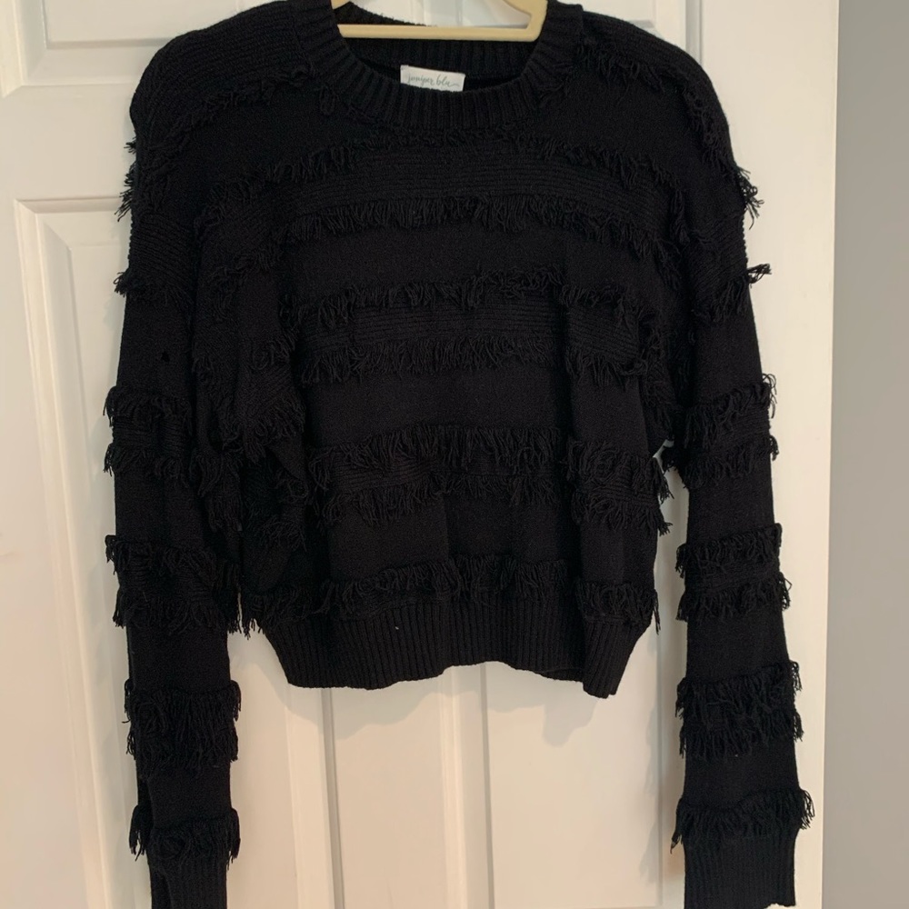 black sweater w fringe detail